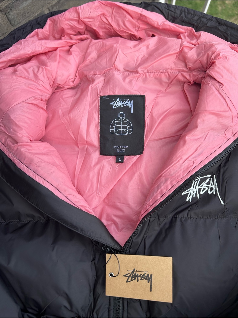 Stussy Black Puffer Jacket with Pink Interior - Picture 2 of 2